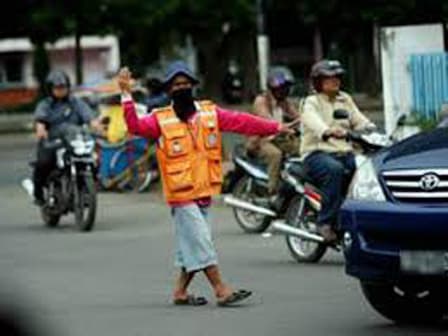 Jadi Penyebab Macet, Pramono Mau Tertibkan Pak Ogah di Jakarta